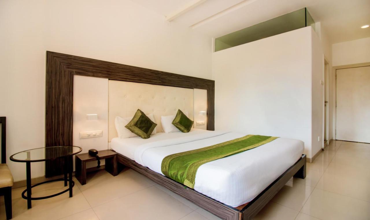 Treebo Trend Golden Nest Hotel Thána Kültér fotó