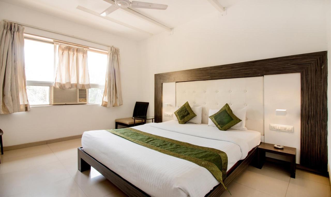 Treebo Trend Golden Nest Hotel Thána Kültér fotó