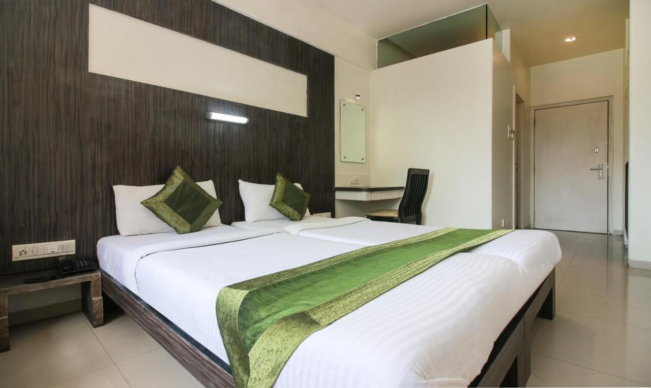 Treebo Trend Golden Nest Hotel Thána Kültér fotó